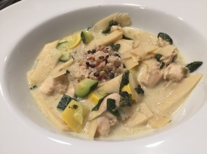 Thai Chicken Green Curry with green and yellow zucchini and bamboo shoots.